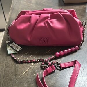Badgley Mischka Pink Clutch with Ruched Design and Metal Hardware